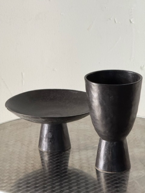 Coppia di oggetti decorativi in legno tornito